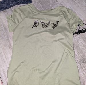 light green shirt with butterflies
